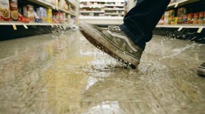 slip and fall inside grocery store puddle of water injury claim