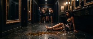 Woman slip and fall on the floor at a nightclub bathroom area