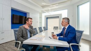 Accident attorney Crenshaw helping injured client after a serious accident