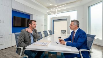 Accident attorney Crenshaw helping injured client after a serious accident