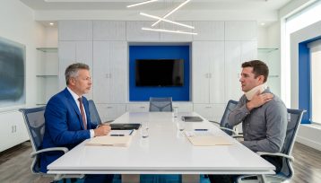 Top rated injury attorney Crenshaw helping injured client after an accident